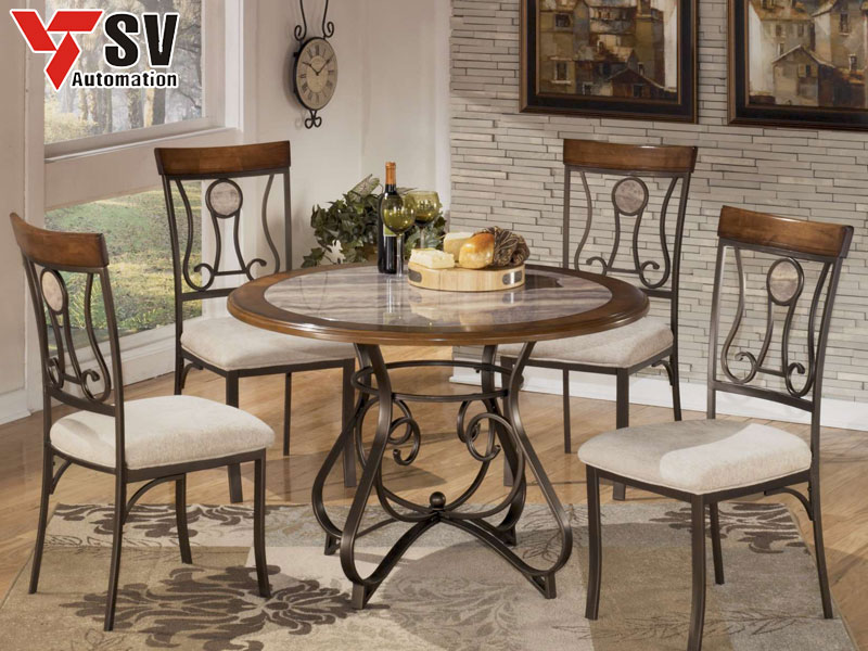 Mẫu 3: Bộ bàn ăn ghế kim loại nổi bật với họa tiết uốn cong đồng bộ giữa chân bàn và lưng tựa ghế